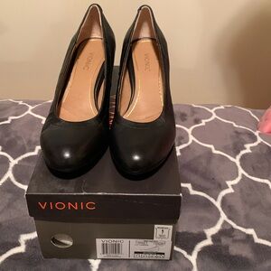 Women’s black leather wedge